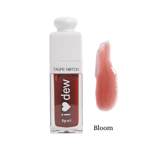 Pink lip oil bottle with glossy swatch, Bloom shade