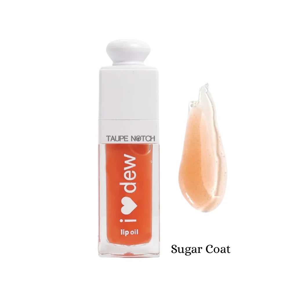 Peach-orange lip oil bottle with glossy swatch, Sugar Coat shade