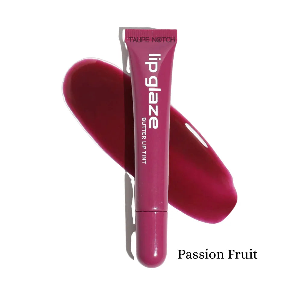 Lip glaze tint in Passion Fruit, magenta tube with glossy swatch
