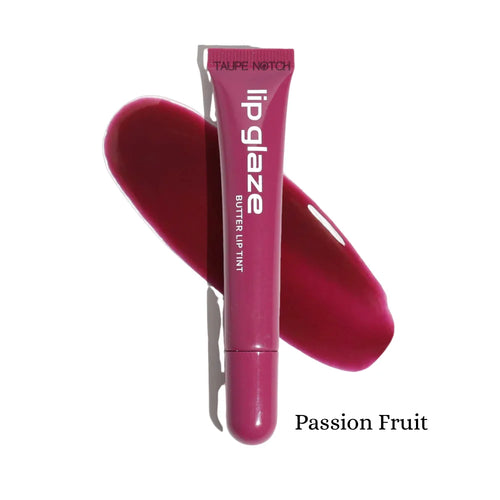 Lip glaze tint in Passion Fruit, magenta tube with glossy swatch