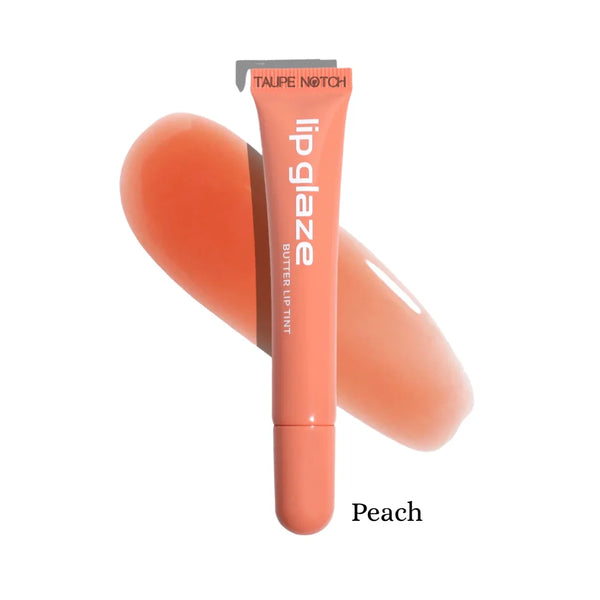 Lip glaze tint in Peach, orange tube with glossy coral swatch