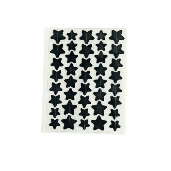 Black star-shaped acne patches sheet with multiple small stars