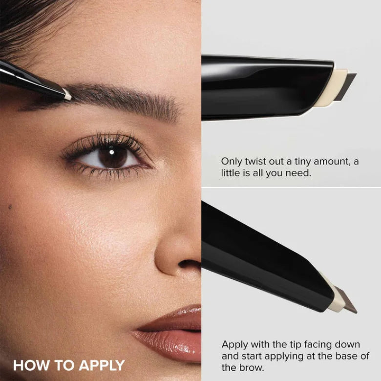 Brow pencil applying product to eyebrow, black twist-up case with beige tip