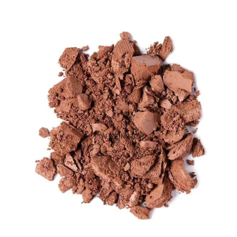 Loose taupe-brown powder bronzer with crumbly, pressed texture