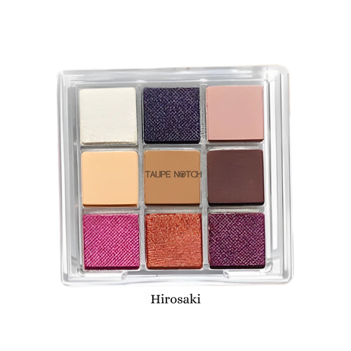 9-color eyeshadow palette with nine colored pans in clear plastic case