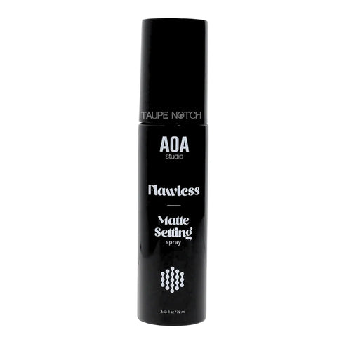 AOA matte setting spray bottle, black with white “Flawless” label