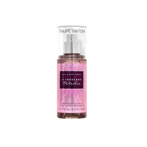 Travel-size fine fragrance mist bottle with clear sprayer and purple glitter liquid