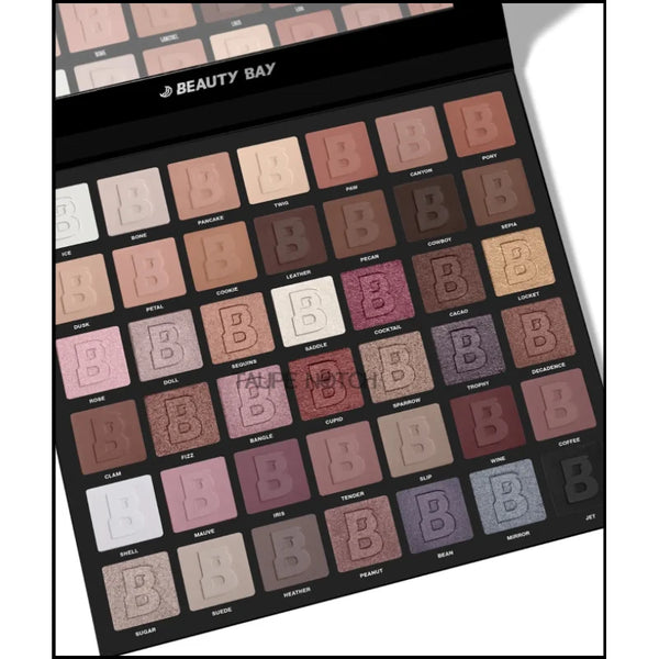 Neutral 42-pan eyeshadow palette open, grid of matte and shimmer nude-brown shades