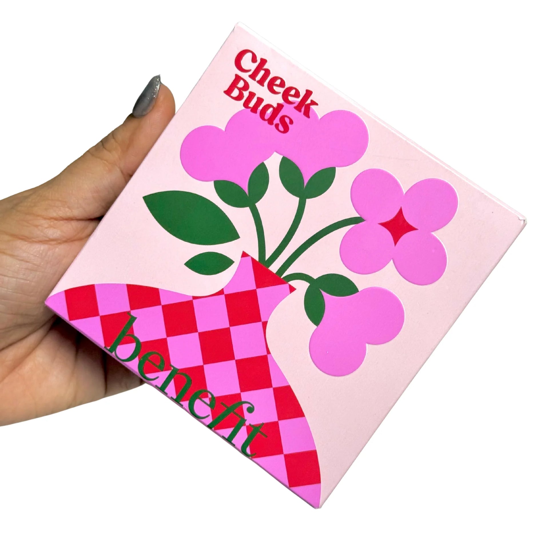 Cheek Buds full face palette box with pink floral design, held in hand