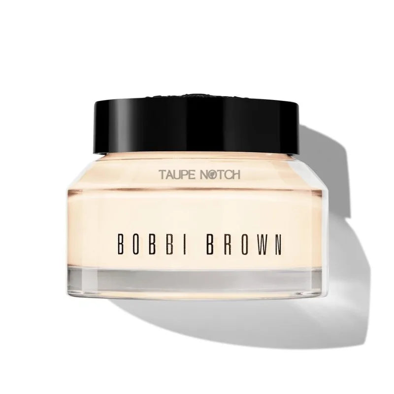 Bobbi Brown face moisturizer and primer in taupe cream bottle with black cap