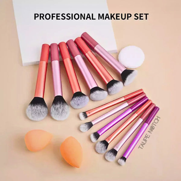Makeup brush set with mixed-color handles, gray bristles, beauty blenders and puff