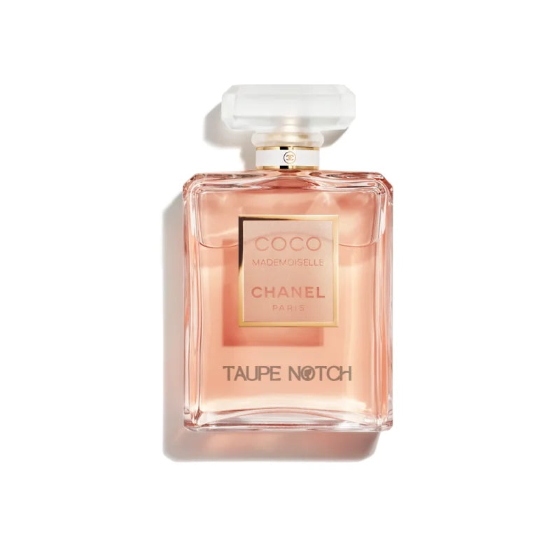 Chanel Coco Mademoiselle eau de parfum bottle, clear peach-pink glass with gold cap