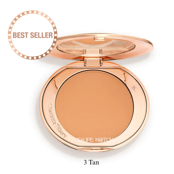 Rose-gold compact foundation with open round pan, shade 3 Tan.