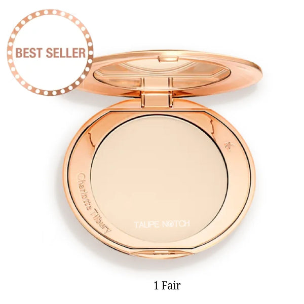Rose-gold compact foundation with open round pan, shade 1 Fair.