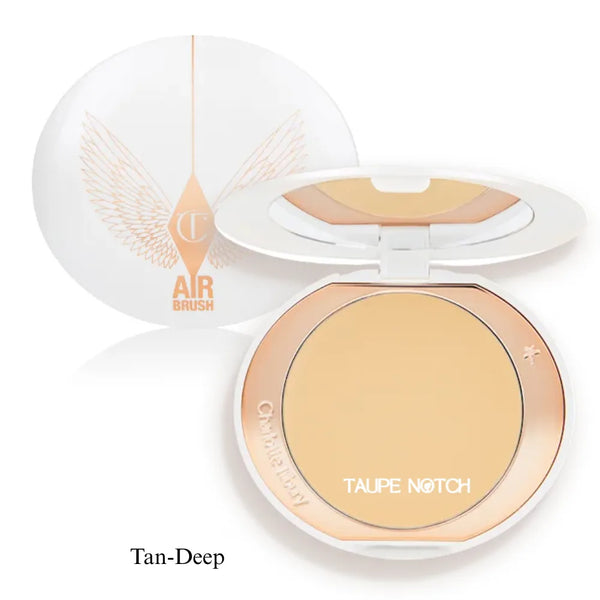 Airbrush brightening powder compact in tan-deep shade, open lid and visible pan
