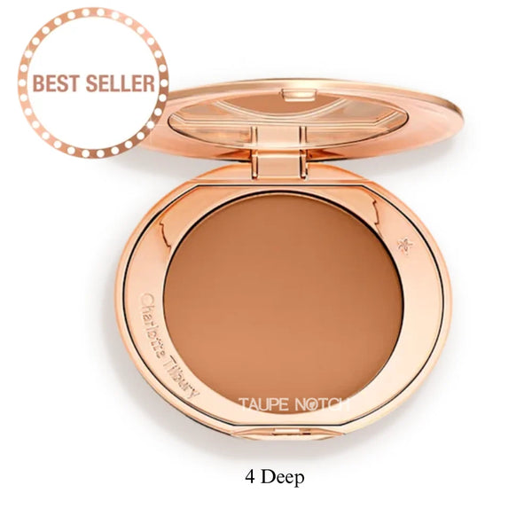 Rose-gold compact foundation with open round pan, shade 4 Deep.