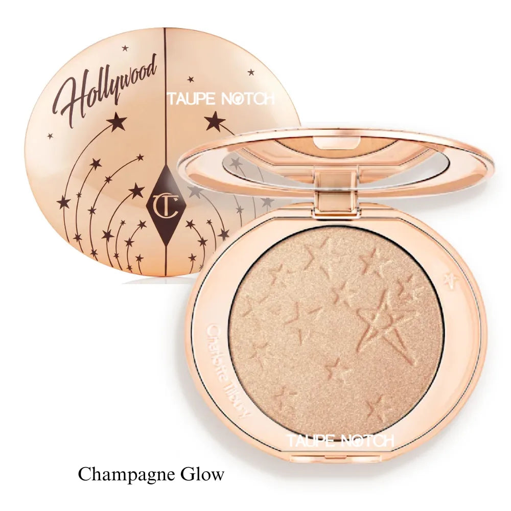 Highlighter compact with champagne-gold shimmer pan and mirror lid