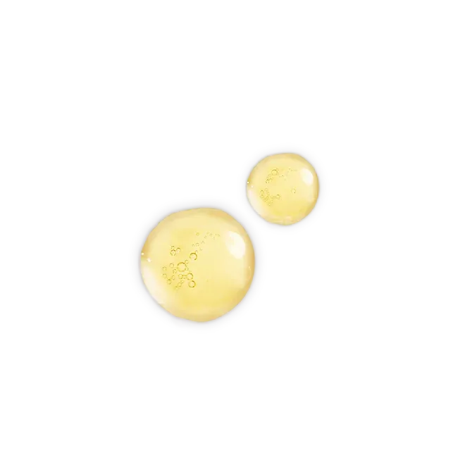 Golden facial oil droplets