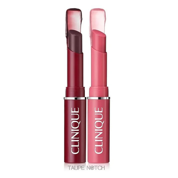 Two lipsticks side by side: dark berry and pink, with exposed bullets