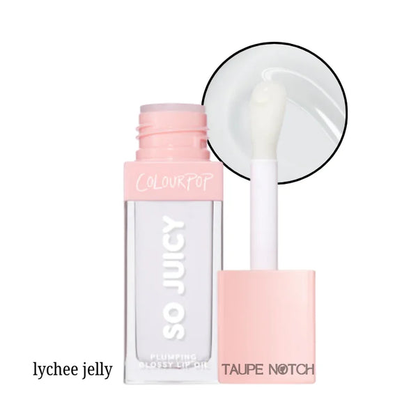 Glossy lip oil in pale cream shade with clear tube and white doe-foot applicator