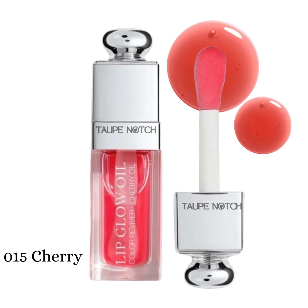 Lip oil with cherry-red tube and doe-foot applicator, with bright red gloss drops