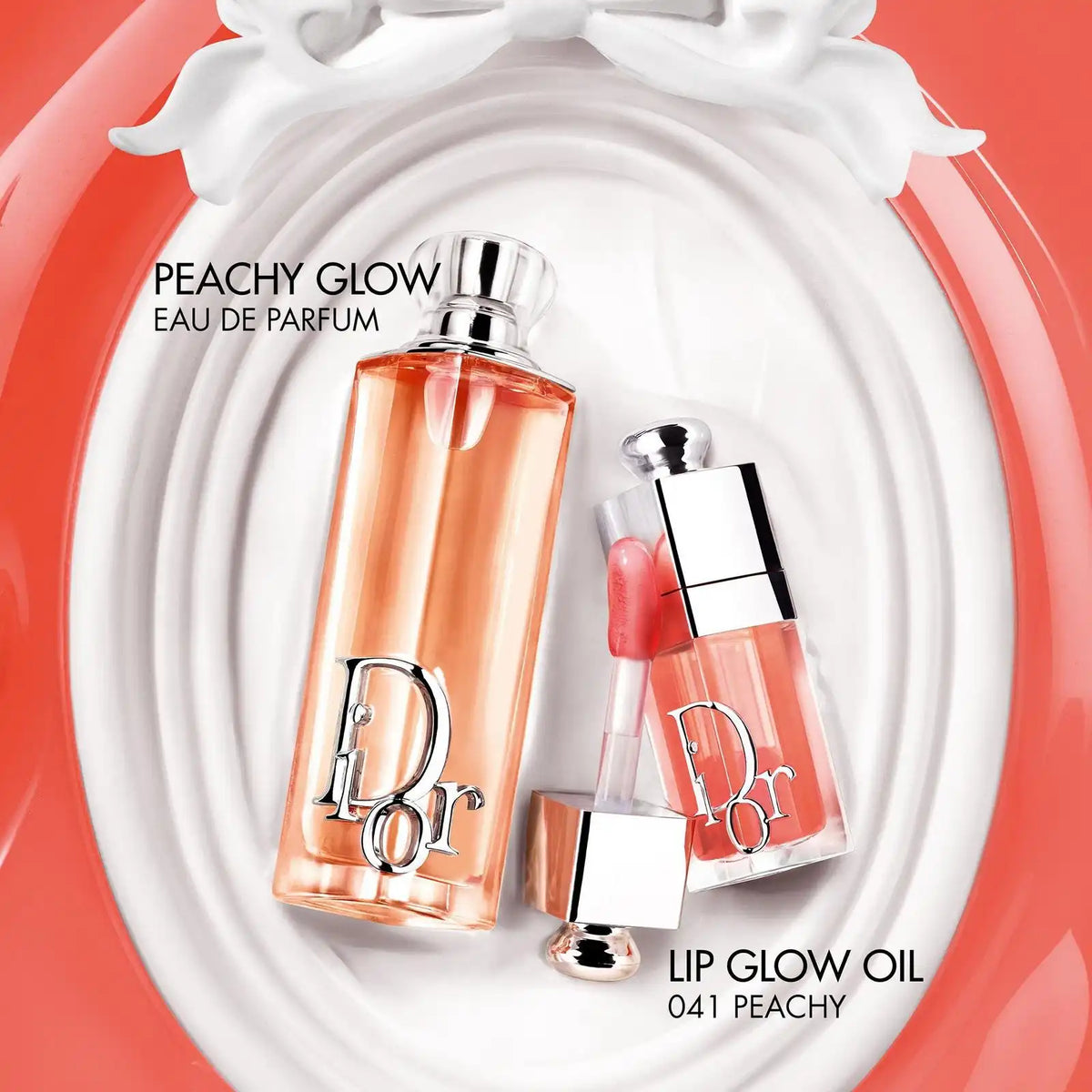 Dior Addict Peachy Glow eau de parfum bottle with peach-orange glass and clear cap