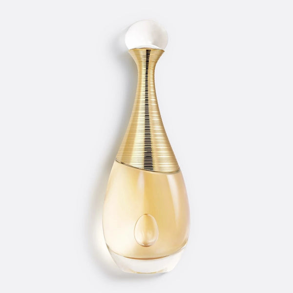 Perfume bottle with gold cap and body on a white background
