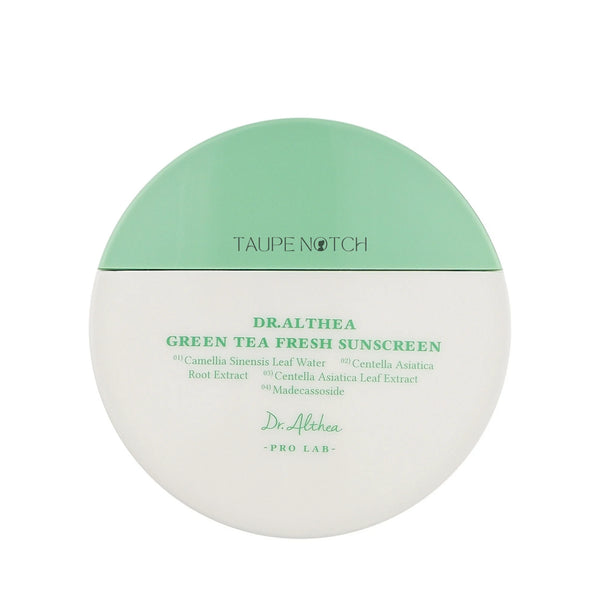 Round sunscreen jar with mint-green lid and white label