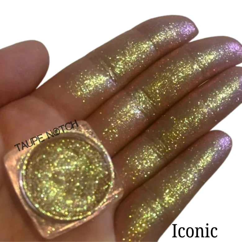 Taupe glitter eyeshadow swatch with sparkly starry shine, shown on fingers