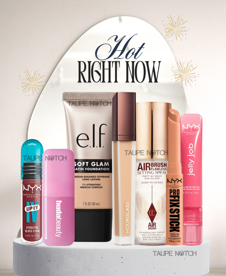 Assorted makeup products from brands including e.l.f., Hourglass, Huda Beauty, and NYX Cosmetics arranged on a white platform with 