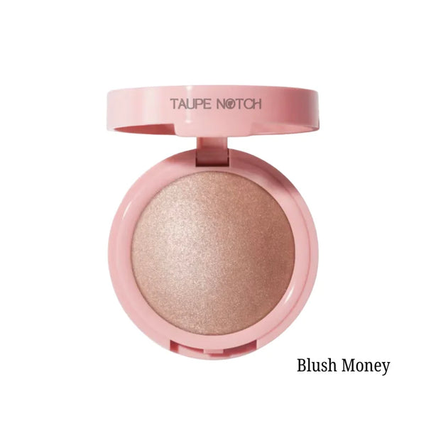 Silky powder highlighter compact with rose-bronze pan, pink casing; Blush Money shade.
