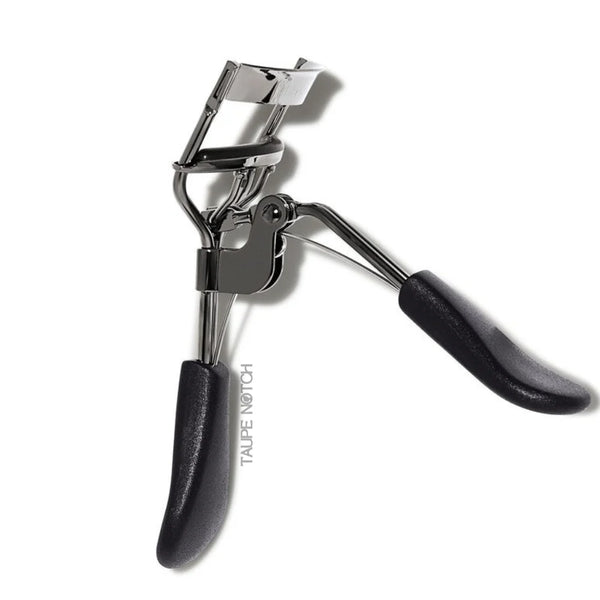 Elf Pro eyelash curler with curved clamp and black handle, silver metal frame