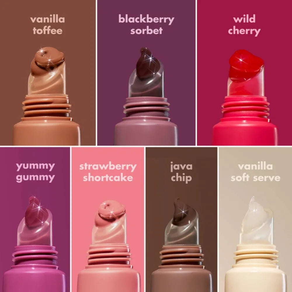 Set of lip balm tubes with different colored balm dollops on tops
