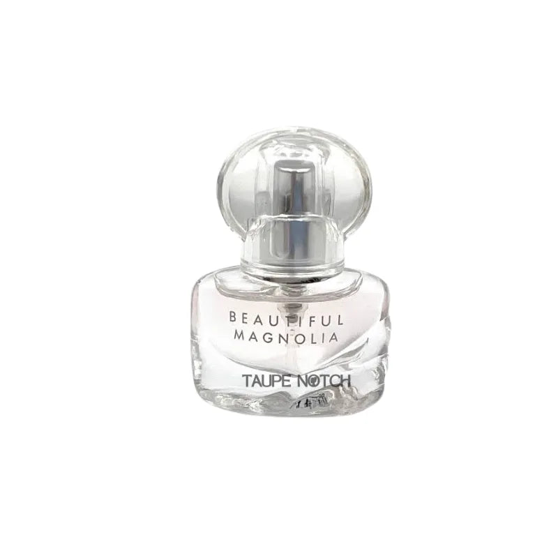 Estee Lauder Beautiful Magnolia eau de parfum spray bottle, clear glass with label