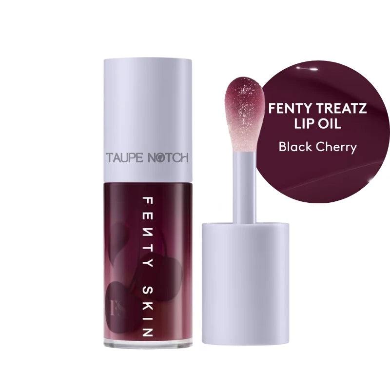 Fenty Treatz lip oil in Black Cherry shade; dark berry tube with wand applicator