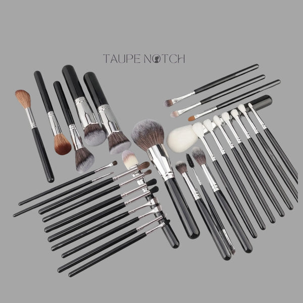 Shein makeup brush set with black and white handles, silver ferrules, includes small detail brushes.