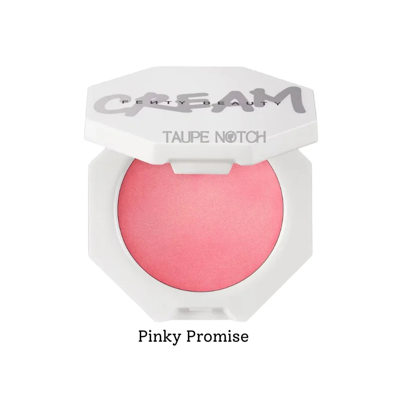Cream blush in pink shade, shown in white compact with curved base.
