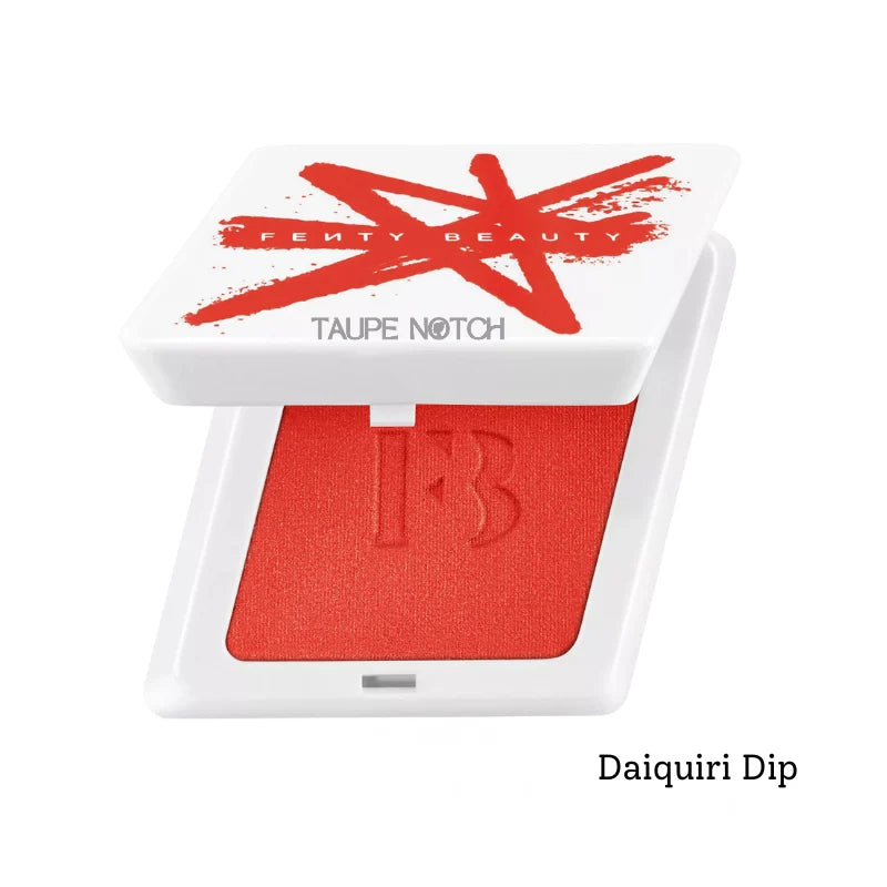 Powder blush compact with coral-red suede powder pan in open case
