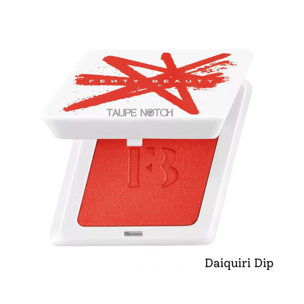 Powder blush compact with coral-red suede powder pan in open case