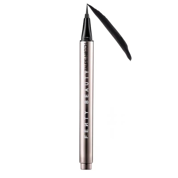 Black liquid eyeliner with pointed applicator tip in metallic tube