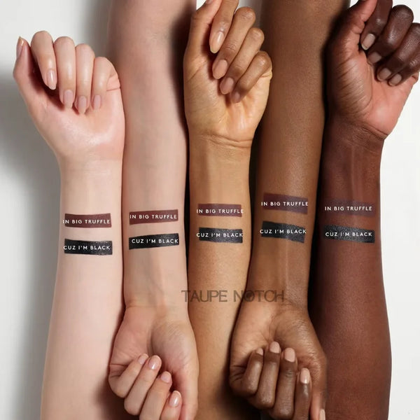 Liquid eyeliner swatches on arms showing dark brown and black lines