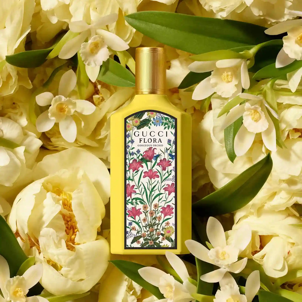 Floral EDP perfume bottle with gold cap and botanical label, framed by white flowers