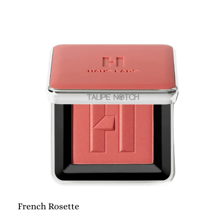Haus Labs Color Fuse Blush Powder in French Rosette – open compact showing muted coral-pink matte pressed blush with embossed HL logo on white background