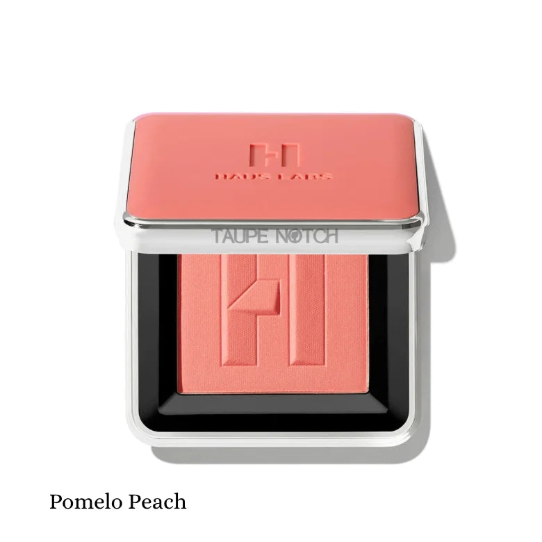 Haus Labs Color Fuse Blush Powder in Pomelo Peach – open compact showing bright peachy-coral matte pressed blush with embossed HL logo on white background