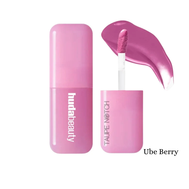 Huda Beauty liquid blush in Ube Berry shade, pastel purple tube with applicator.