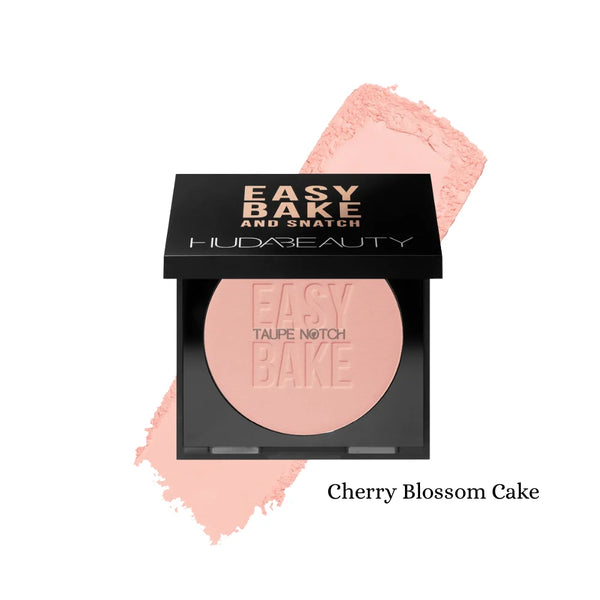 Pressed powder compact by Huda Beauty in black case, soft pink shade (Cherry Blossom Cake)