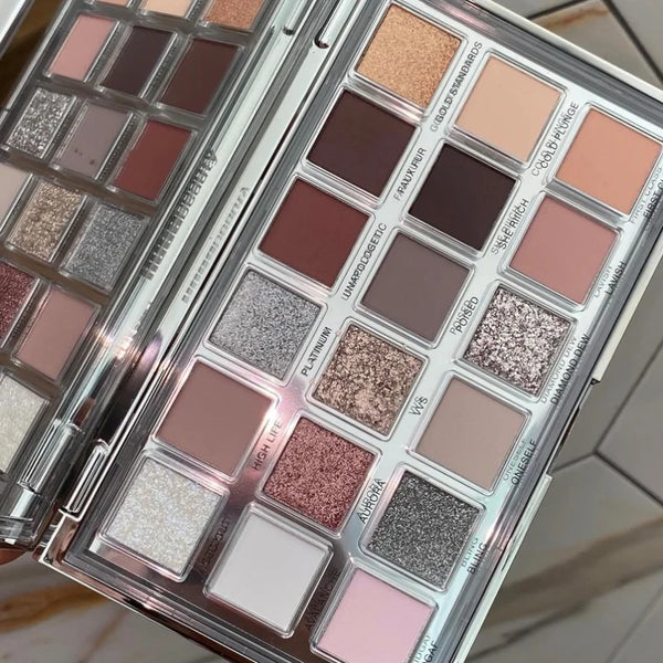 Eyeshadow palette inside view with nude matte and sparkling metallic pans
