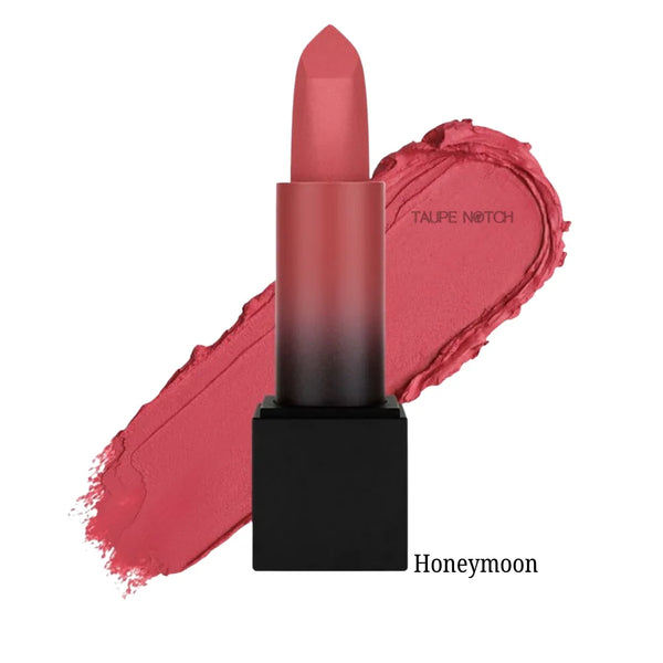 Matte hot pink lipstick with bullet tip and black base