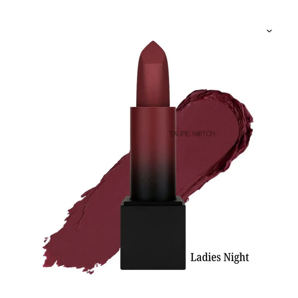 Matte lipstick bullet with dark plum-red shade on lip swatch, “Ladies Night” label