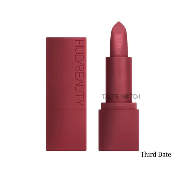 Matte burgundy lipstick with bullet tip and maroon case